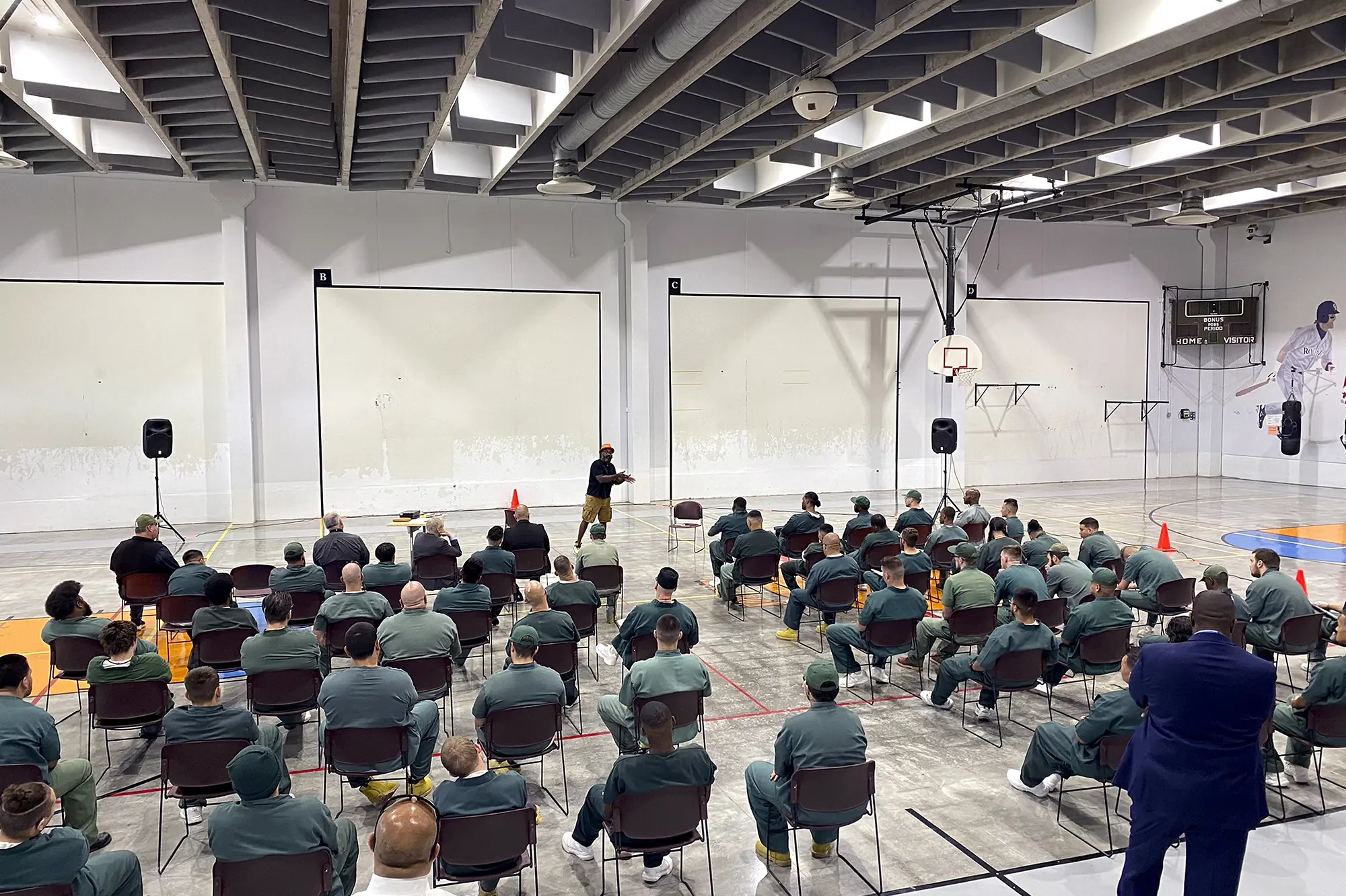 Freedom Reads Founder & CEO Reginald Dwayne Betts performs his one man show FELON: An American Washi Tale to a large audience inside of Arkansas Valley Correctional Facility in Colorado.